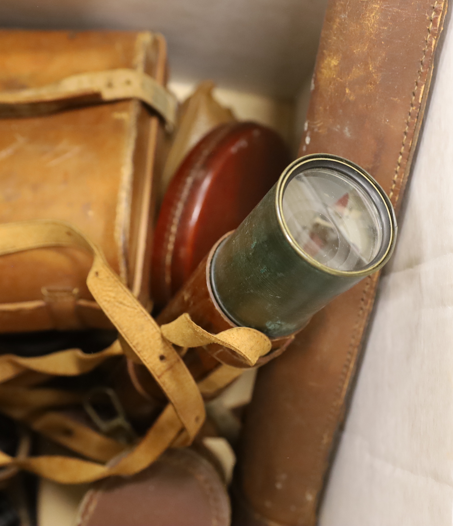 Mixed leather cased instruments, two pairs of binoculars, cameras etc